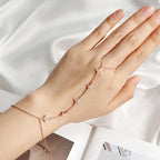 Stone Twilight Hand Chain Bracelet in rose 14k gold on a human model